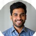 Photo of Amit Verma, smiling confidently.